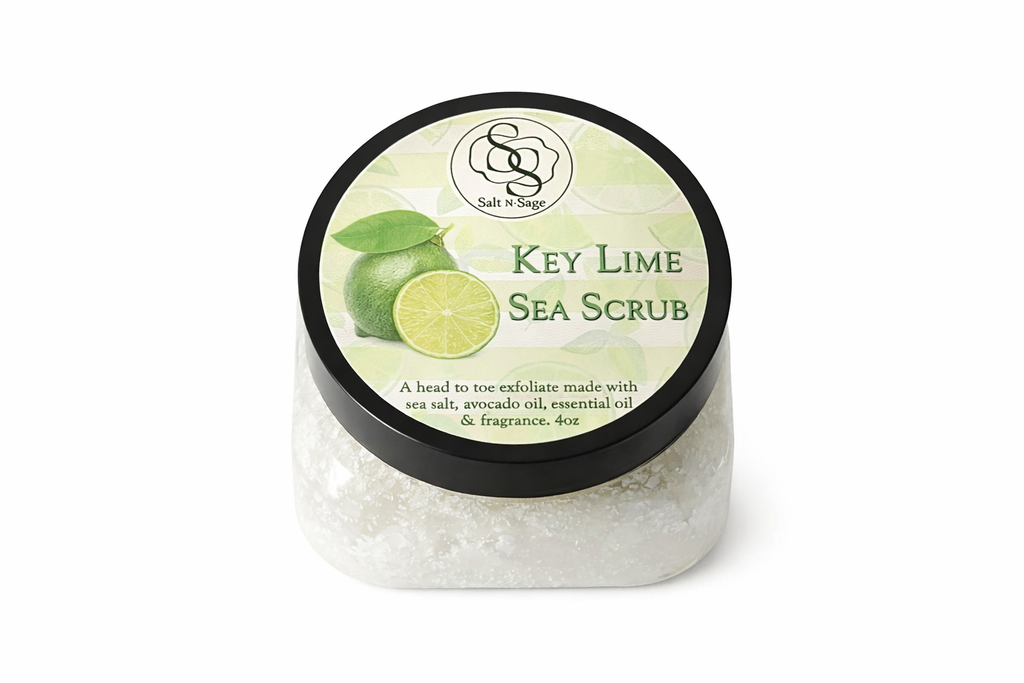 Salt N Sage Key Lime Salt Scrub in 4 oz. jar with fresh lime slices and exfoliating texture, designed for gentle skin renewal.