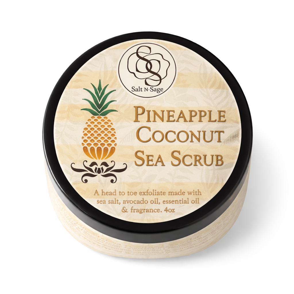 Salt N Sage Pineapple Coconut Sea Scrub in a 4 oz jar with fresh pineapple and coconut ingredients visible.